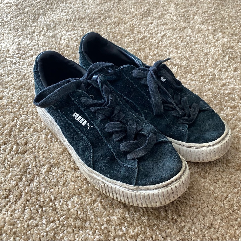 Black Puma sneakers